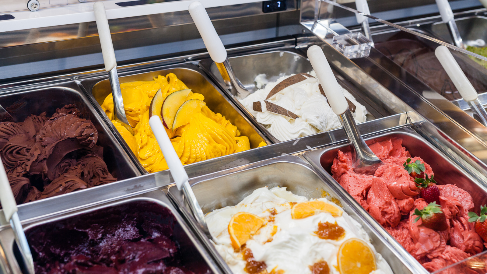 Italian gelato display with various colourful flavours